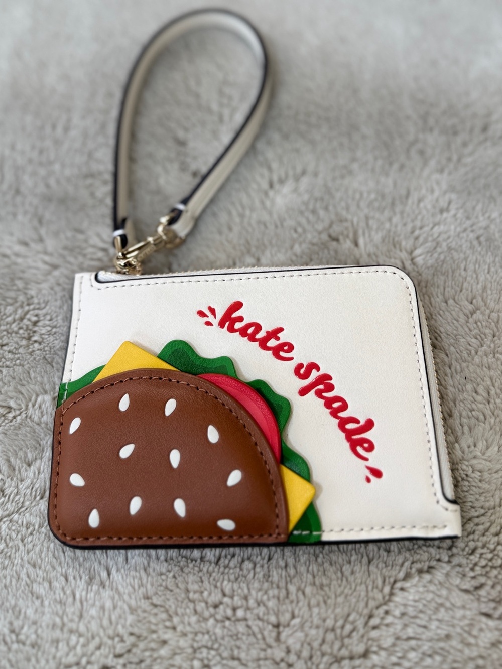 kate spade zip-around wristlet with gold hardware